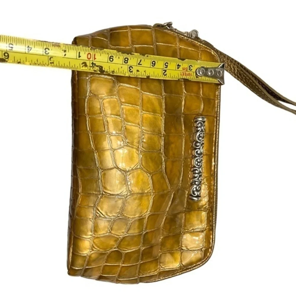 Brighton embossed leather shiny wristlet bag